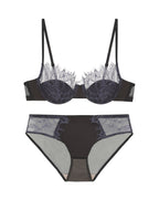 Darette Second Skin Lace Set in Noir - product flat lay of the lace bra and matching briefs