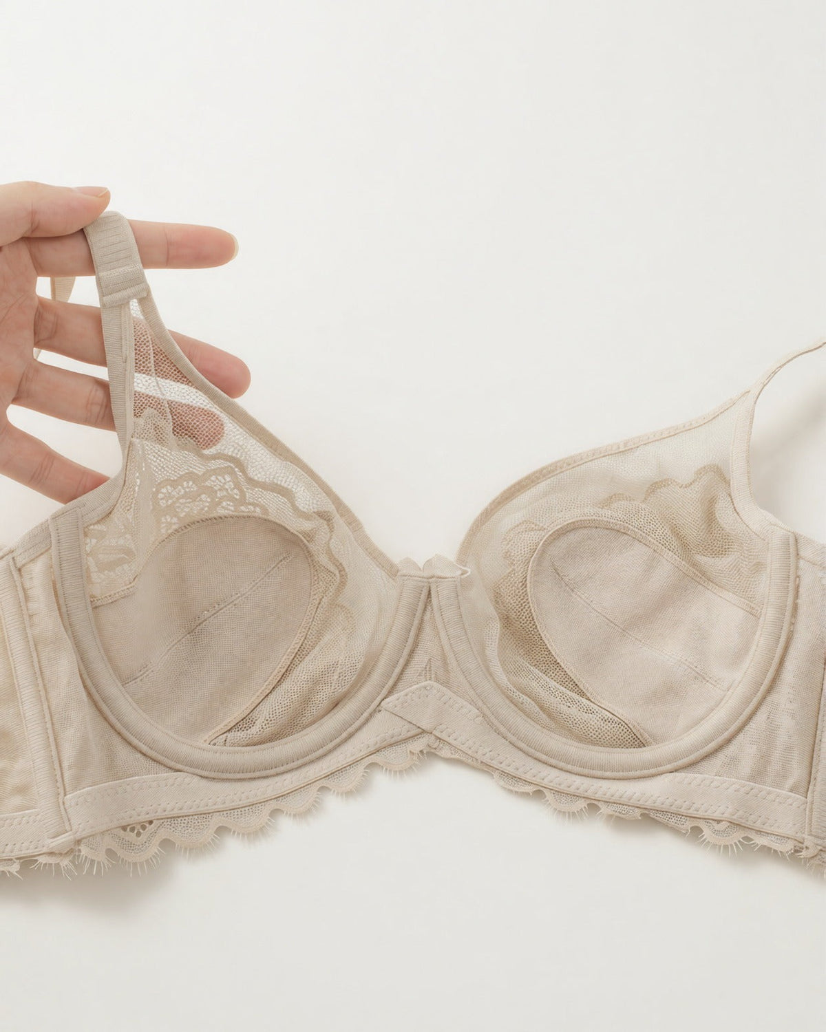 Darette The Confidante Lace Set in Crème - held flat to show the bra's construction and straps