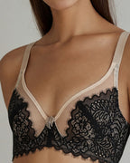 Darette The Confidante Lace Set in Noir - close-up front view of the lace bra with a center bow