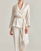 Darette The Long Weekend Silk Set in Ivory - shawl-collar wrap shirt with contrast piping and tie belt, studio front view