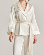 Darette The Long Weekend Silk Set in Ivory - wrap shirt tied at the waist with piped cuffs, studio three-quarter view