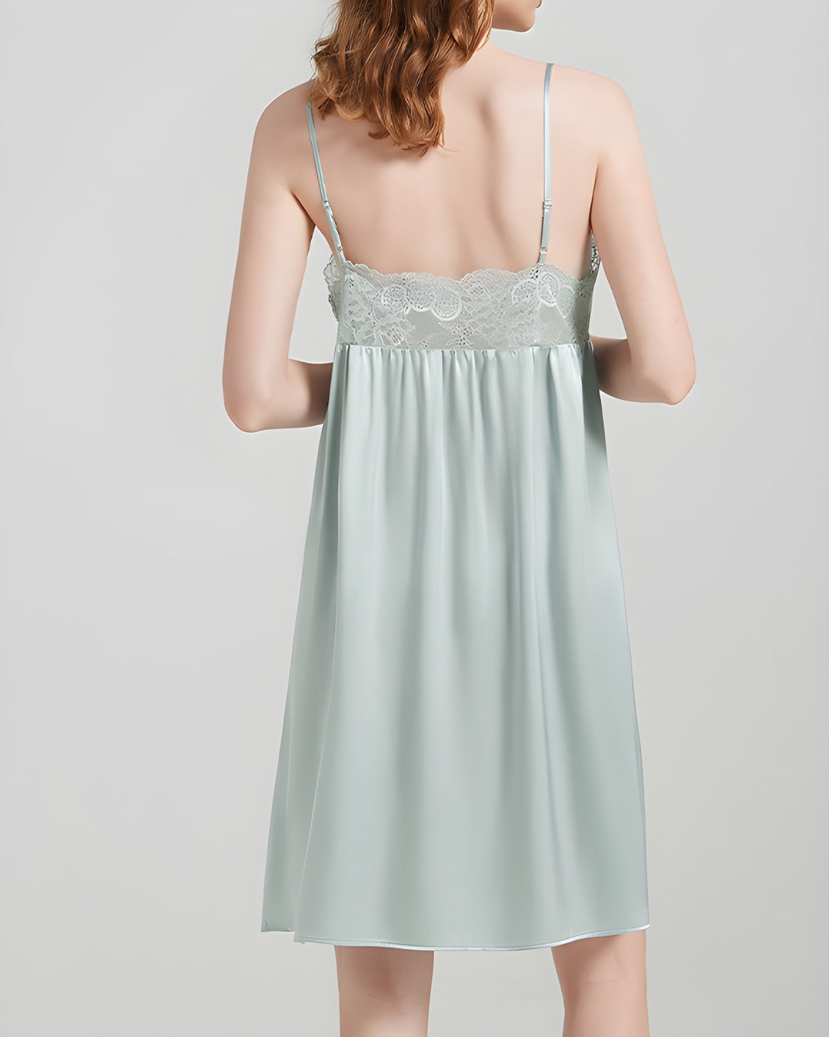 Back view of the Darette The Real Thing Silk Slip in Sage, showing the lace shoulder straps and satin skirt