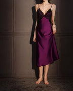 Darette Trailing Off Slip in Plum - lace-bodice satin slip dress in a dimly lit interior